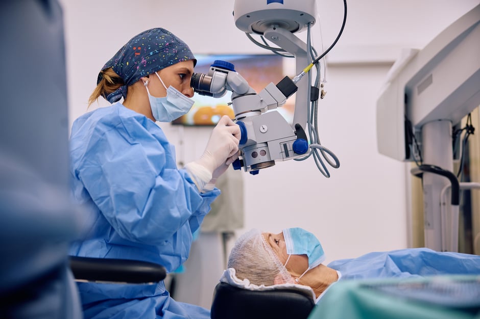Ophthalmologist examining a patient before a procedure in an ASC.